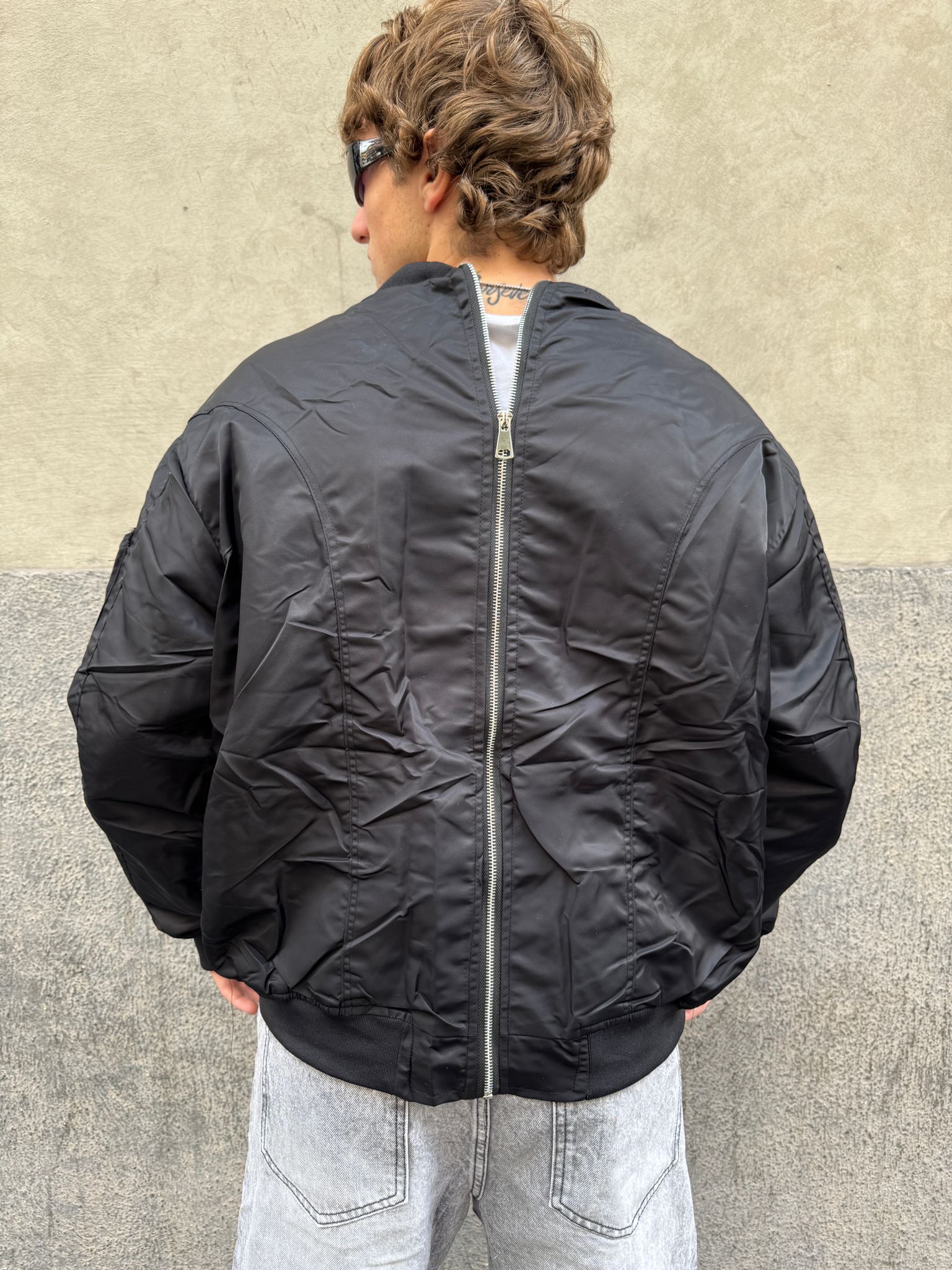 Bomber con Zip sul retro Nero